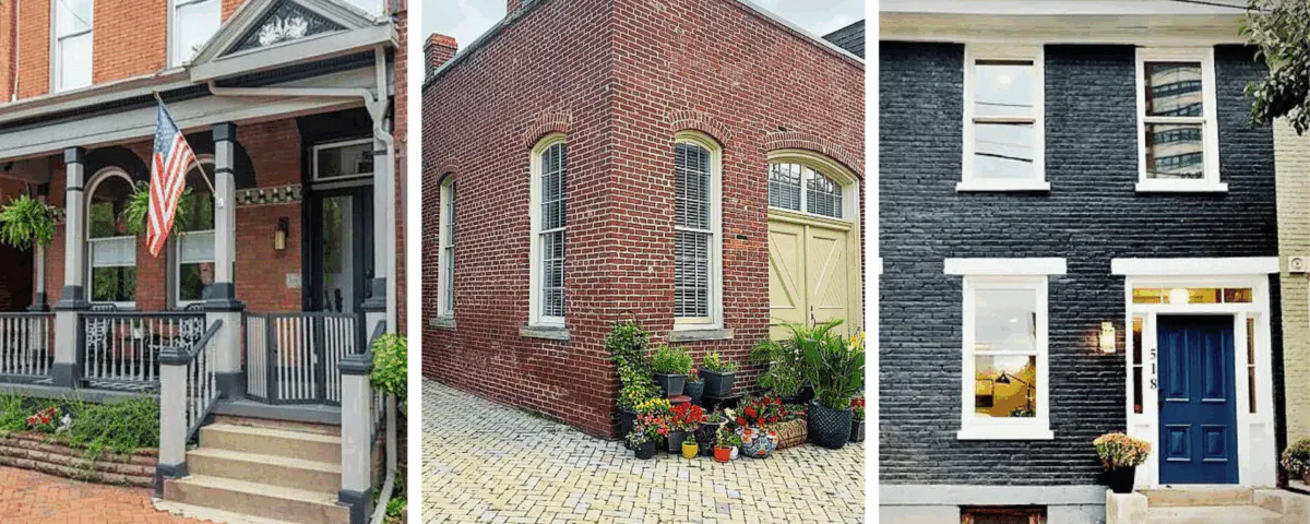 a bench in front of a brick building