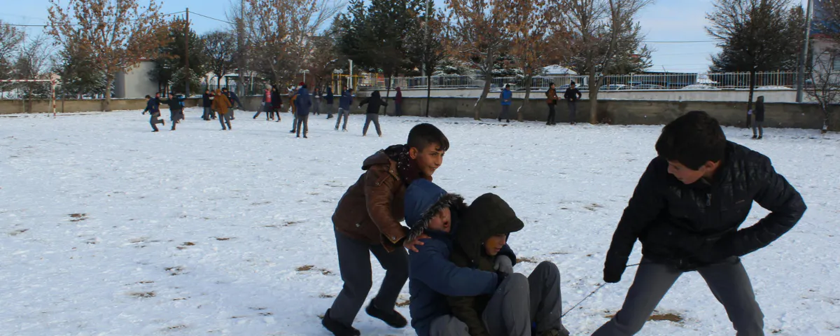 a group of people in the snow