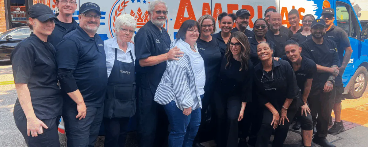 a group of people posing for a photo