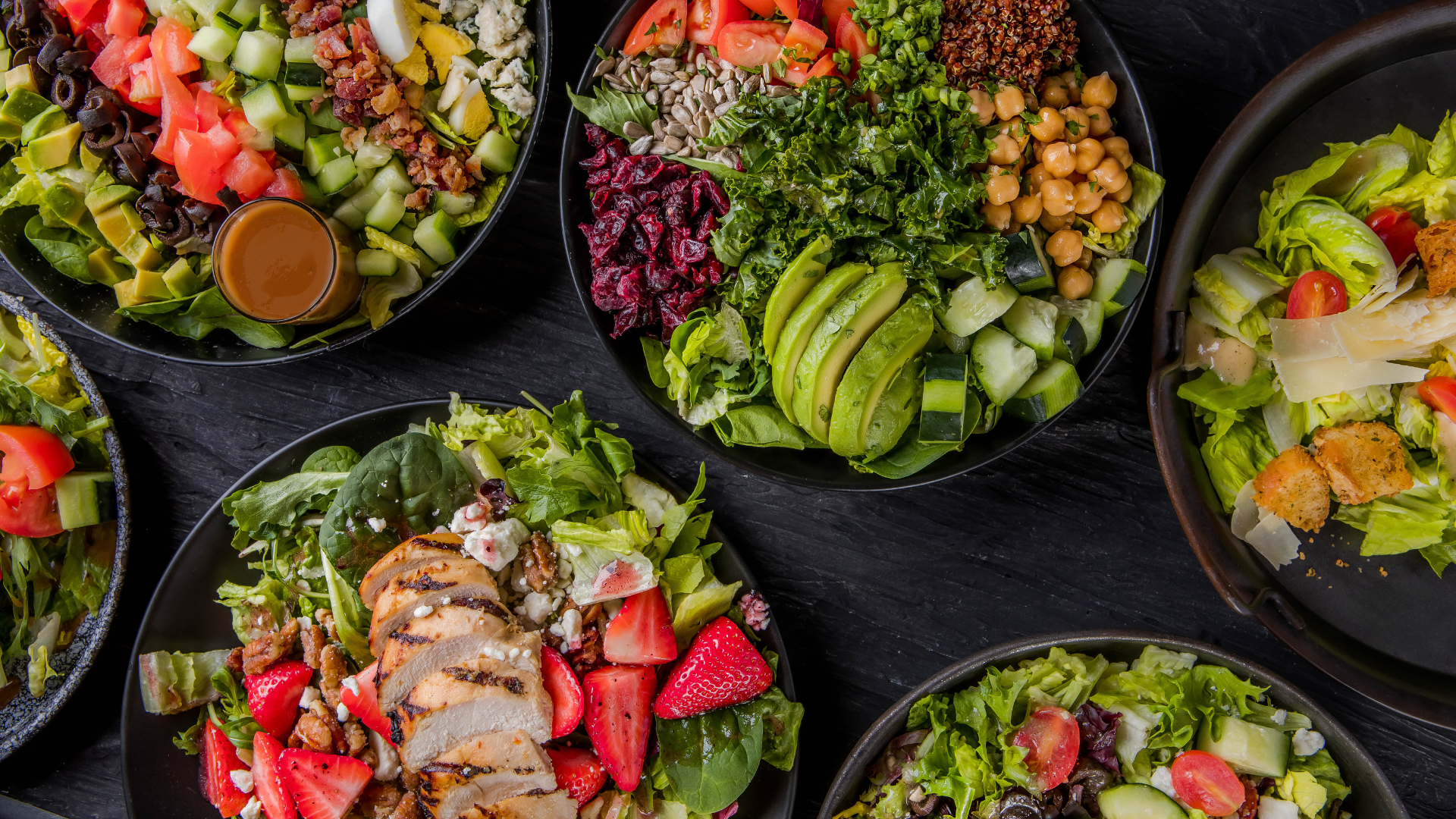 a bowl filled with different types of food on a table