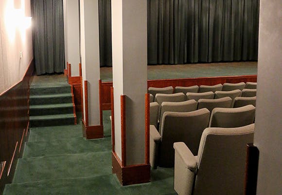 a large red chair in a room
