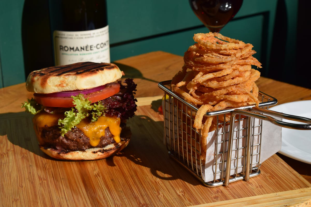 a sandwich sitting on top of a wooden table