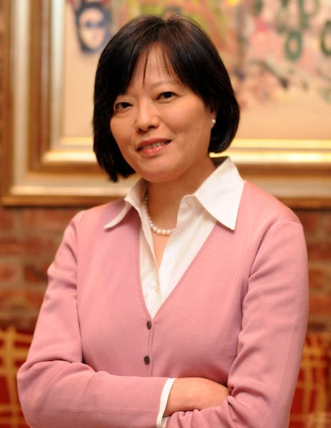 a woman smiling for the camera