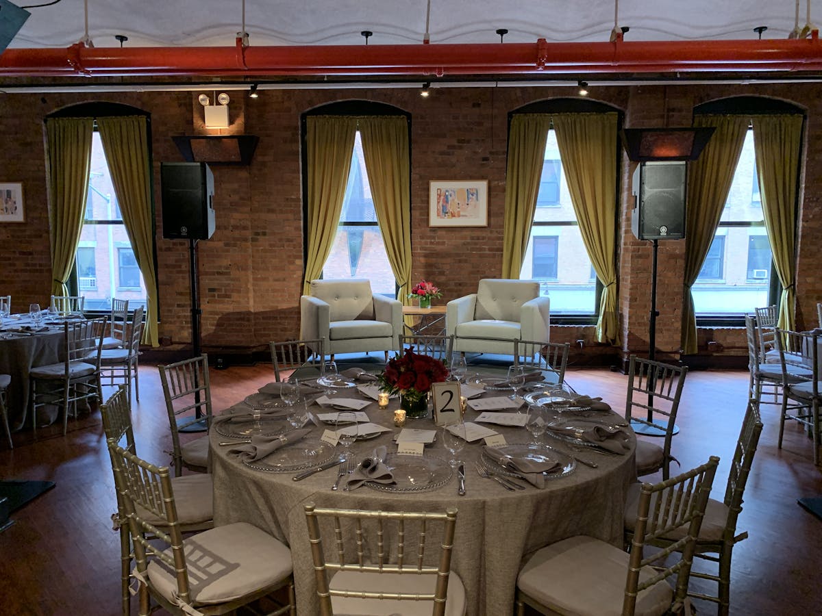 a dining room table in front of a building