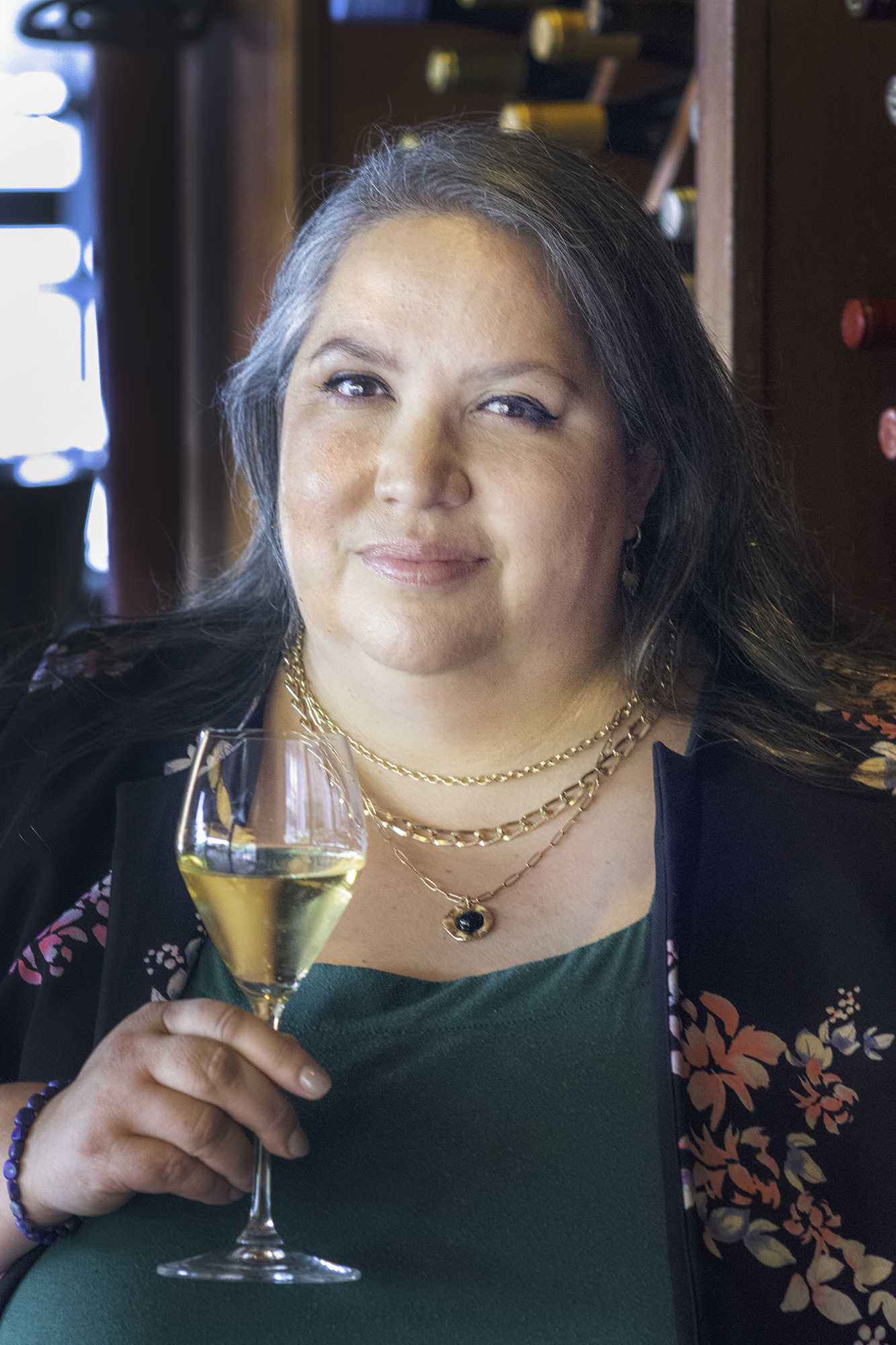 a person holding a glass of wine