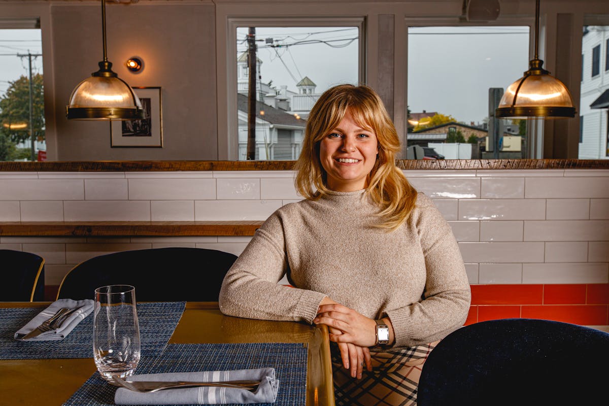 a woman smiling at the camera
