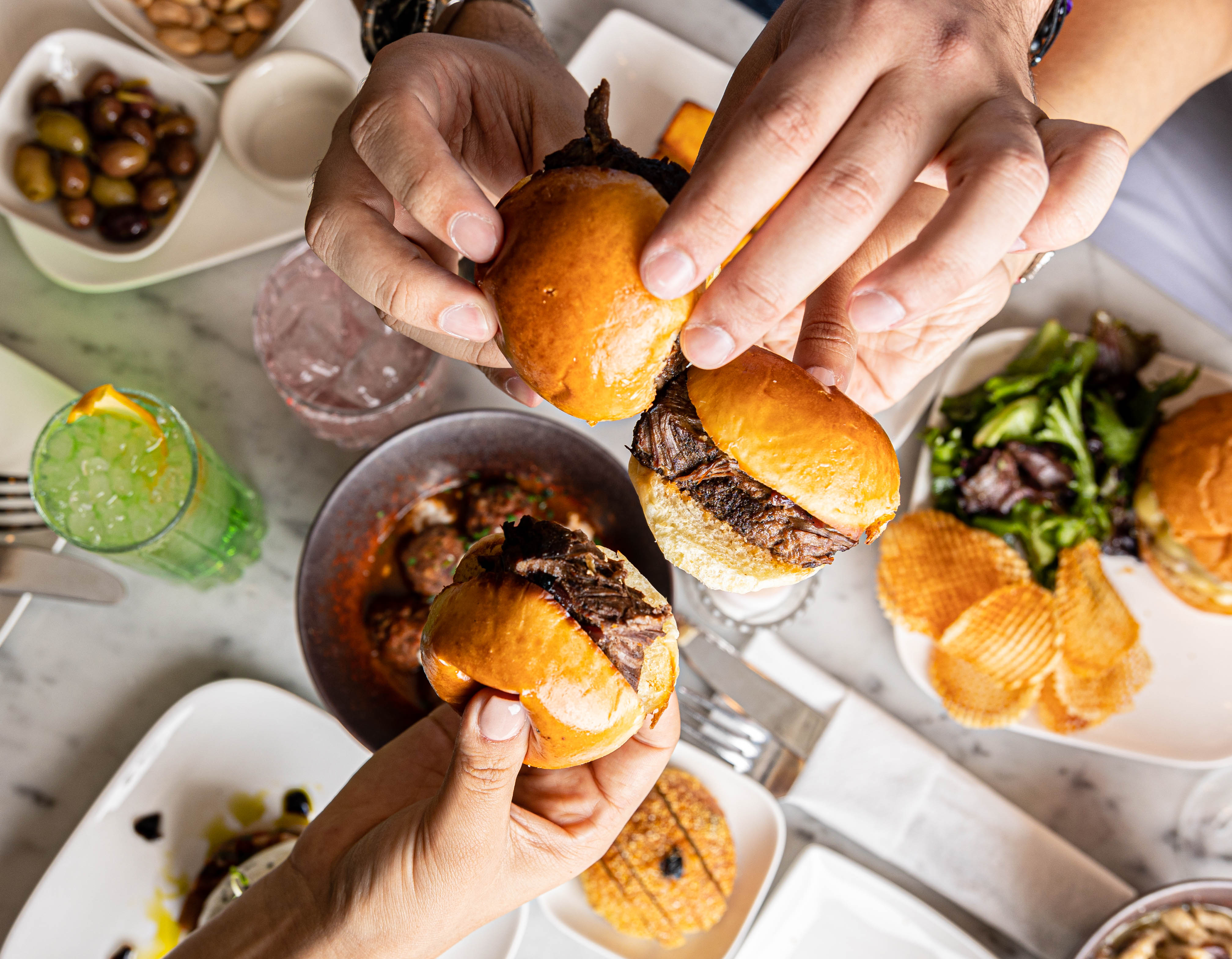 a person holding a plate of food
