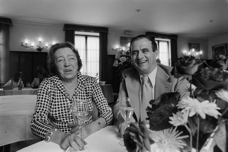 Paul Bocuse et al. standing in a room