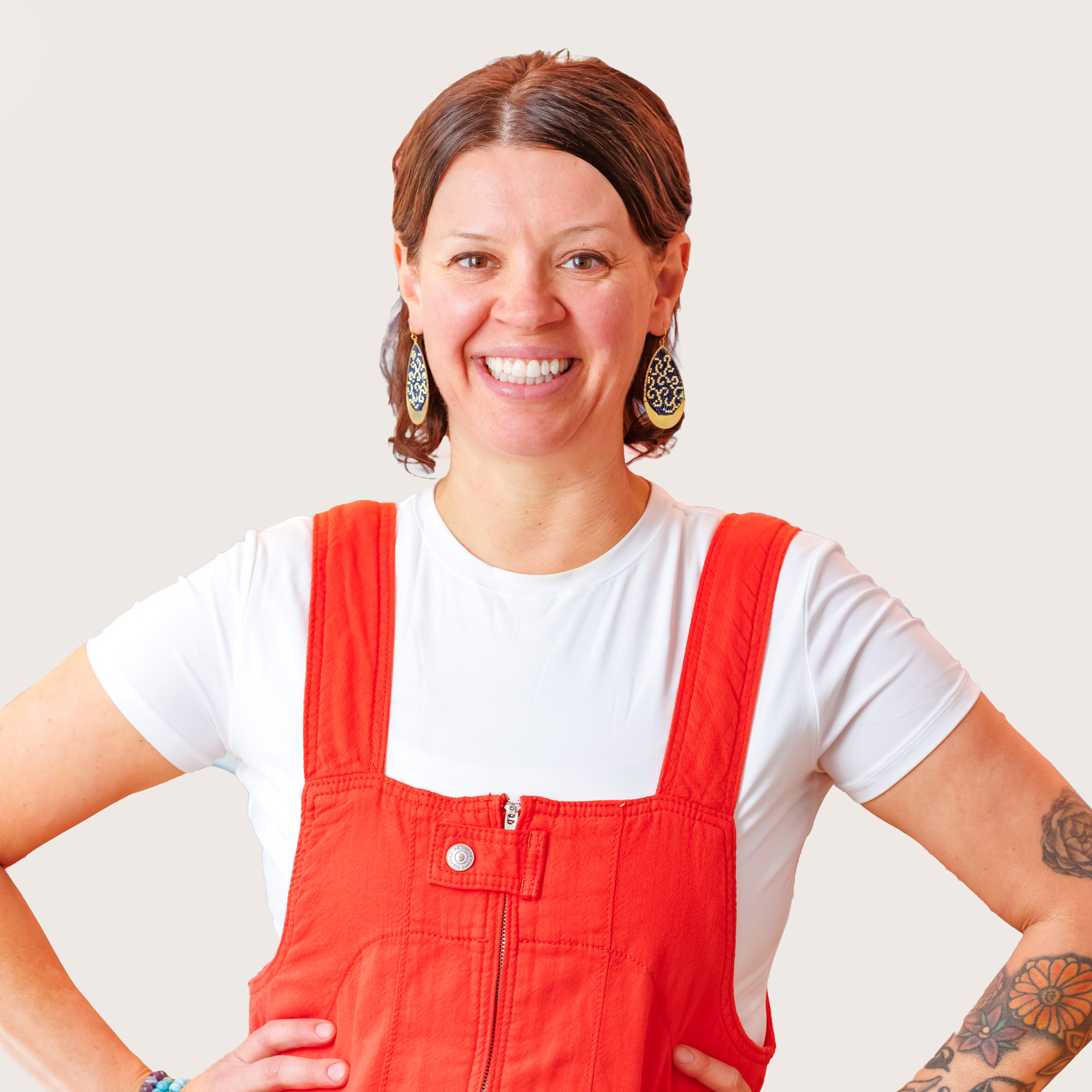 a woman with tattoos on her arm
