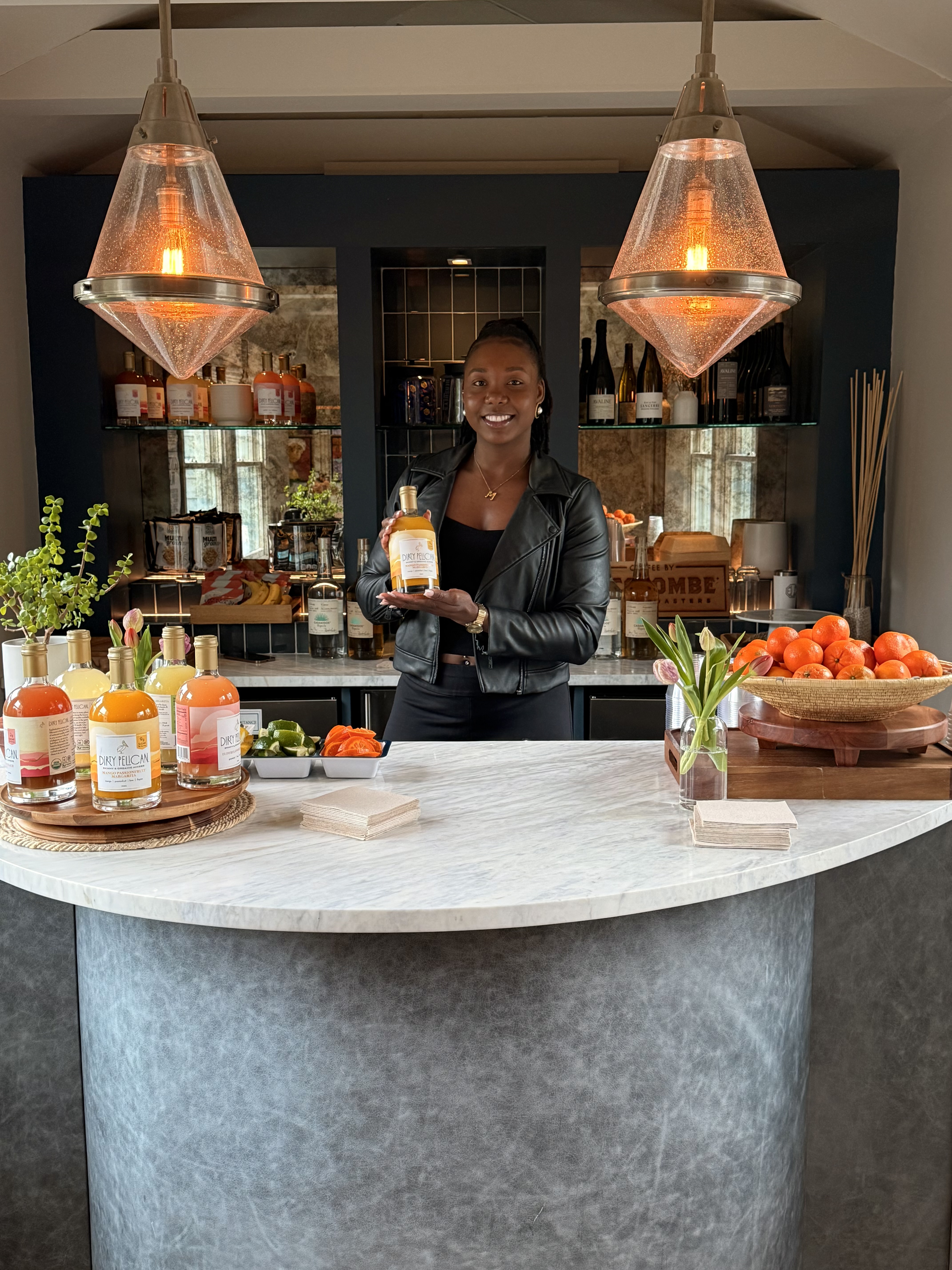 a group of people sitting at a table in front of a building