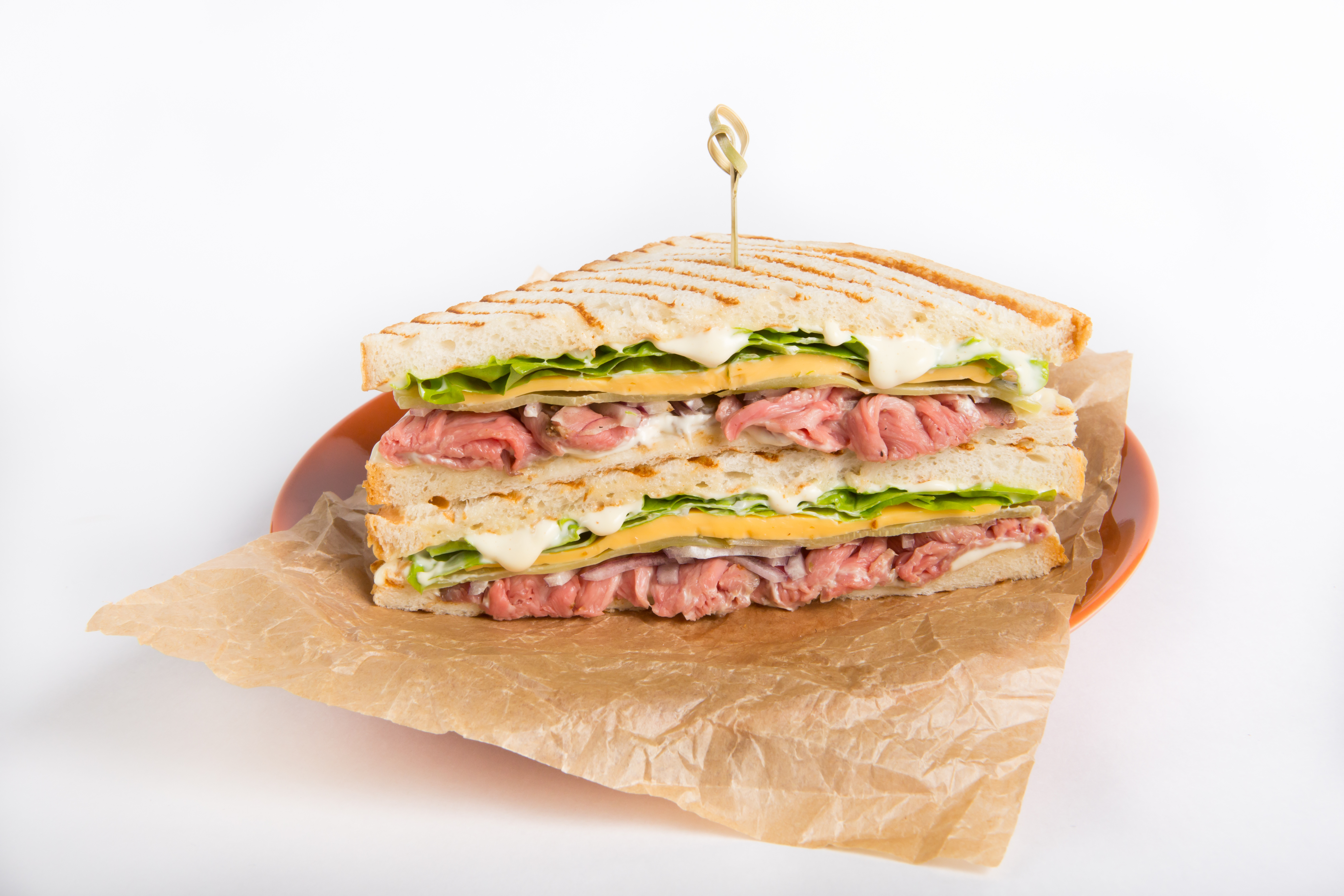 a close up of a sandwich sitting on top of a table