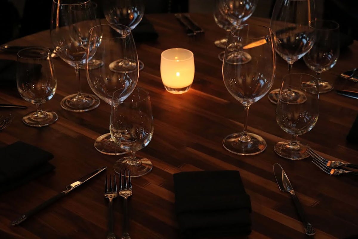 a table with wine glasses