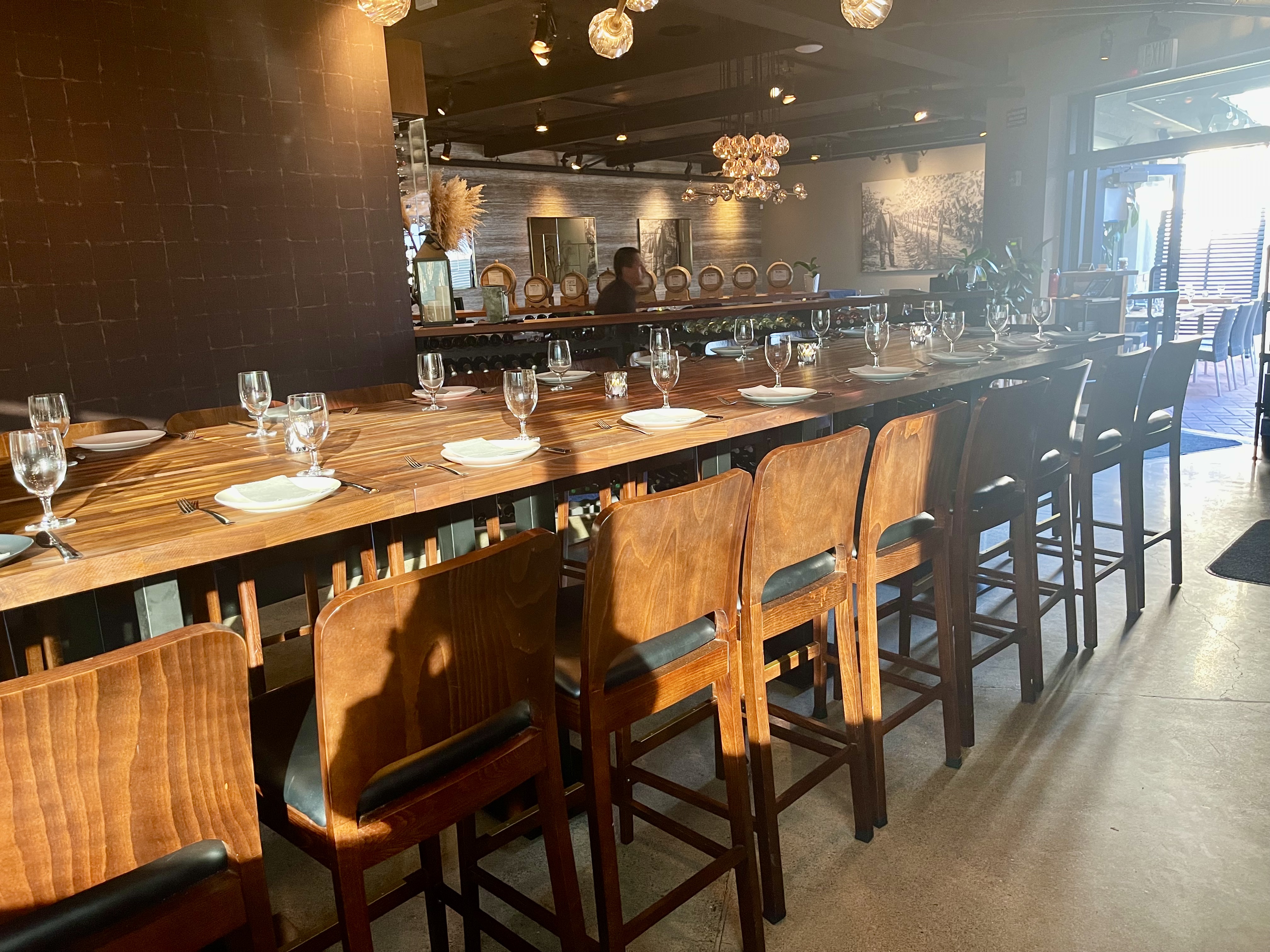a row of wooden benches sitting on top of a table