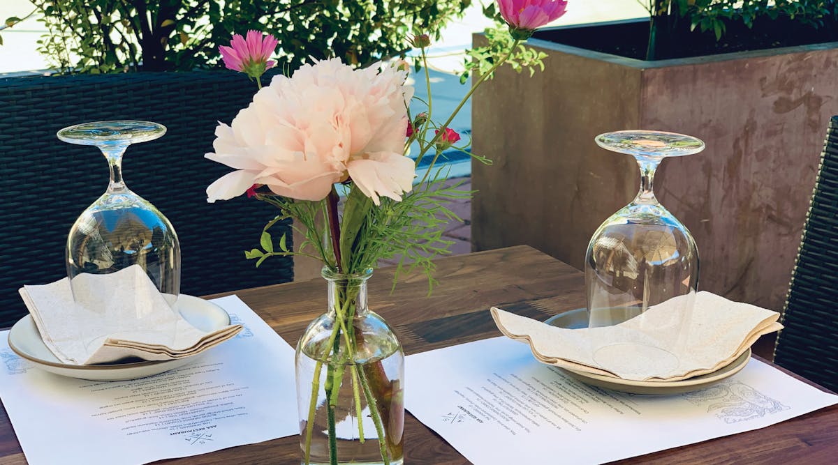a vase of flowers on a table