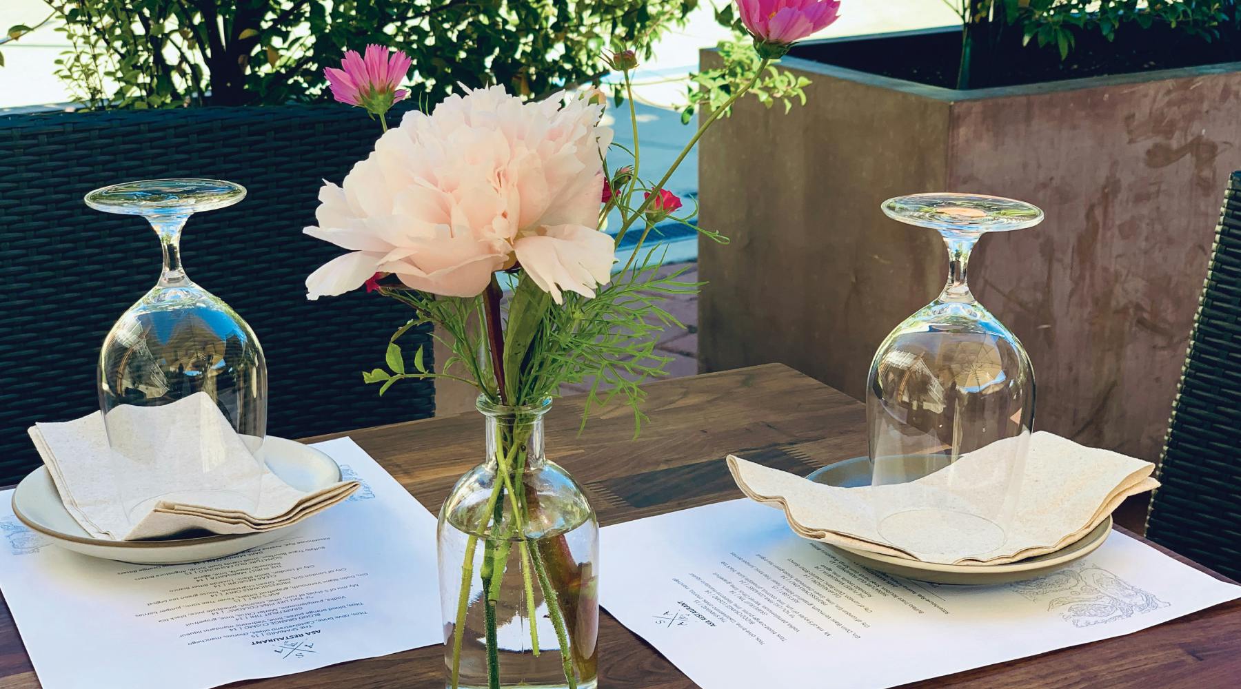 a vase of flowers on a table