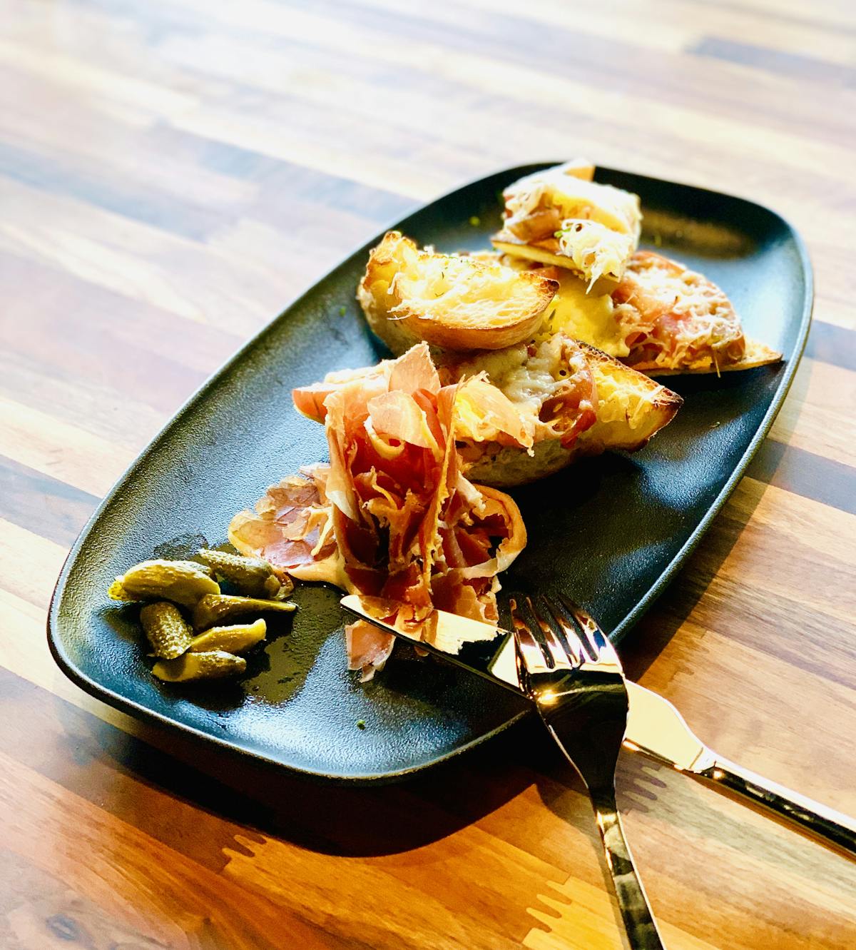 a plate of food with a fork and knife