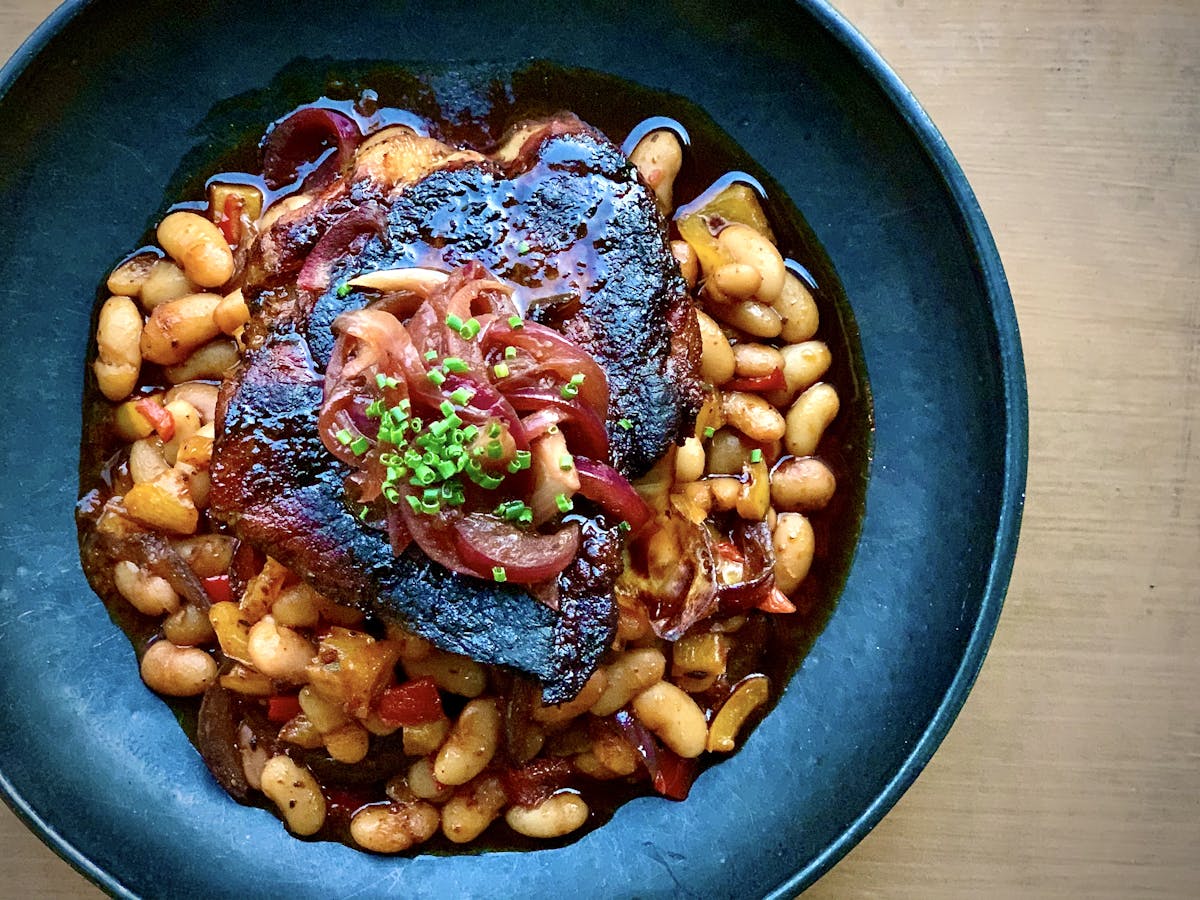 a bowl of food on a blue plate