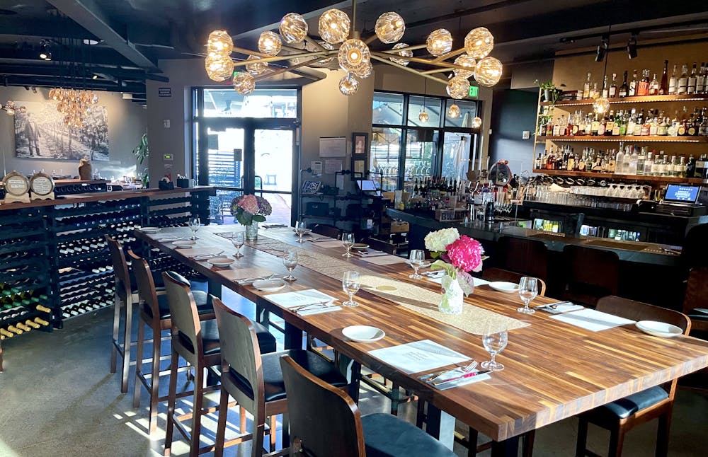 a room filled with furniture and a table in a restaurant