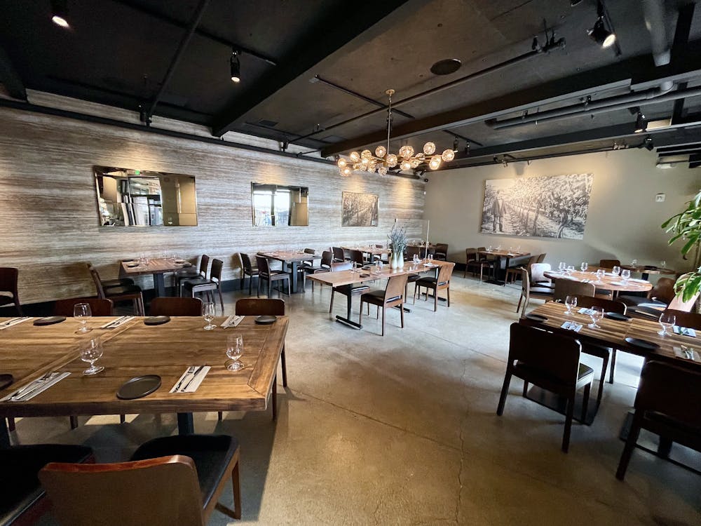 a room filled with furniture and a table in a restaurant