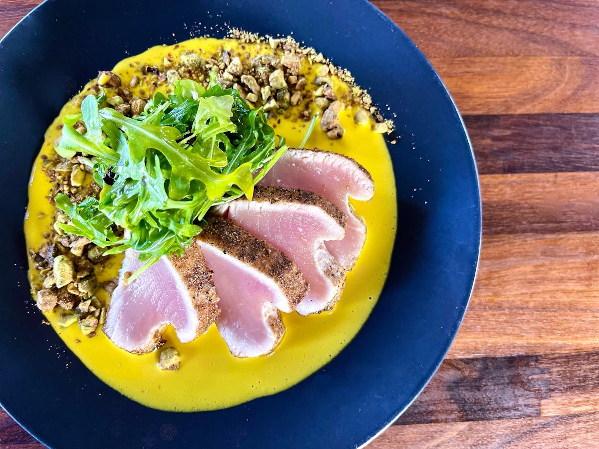 a close up of food on a blue plate