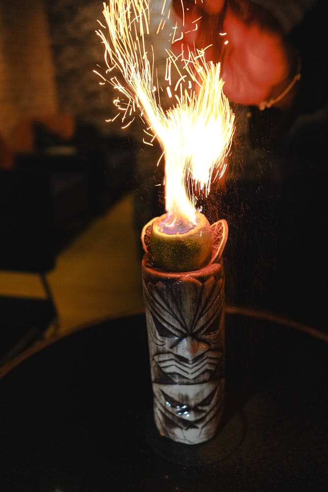 a vase sitting on top of a fire