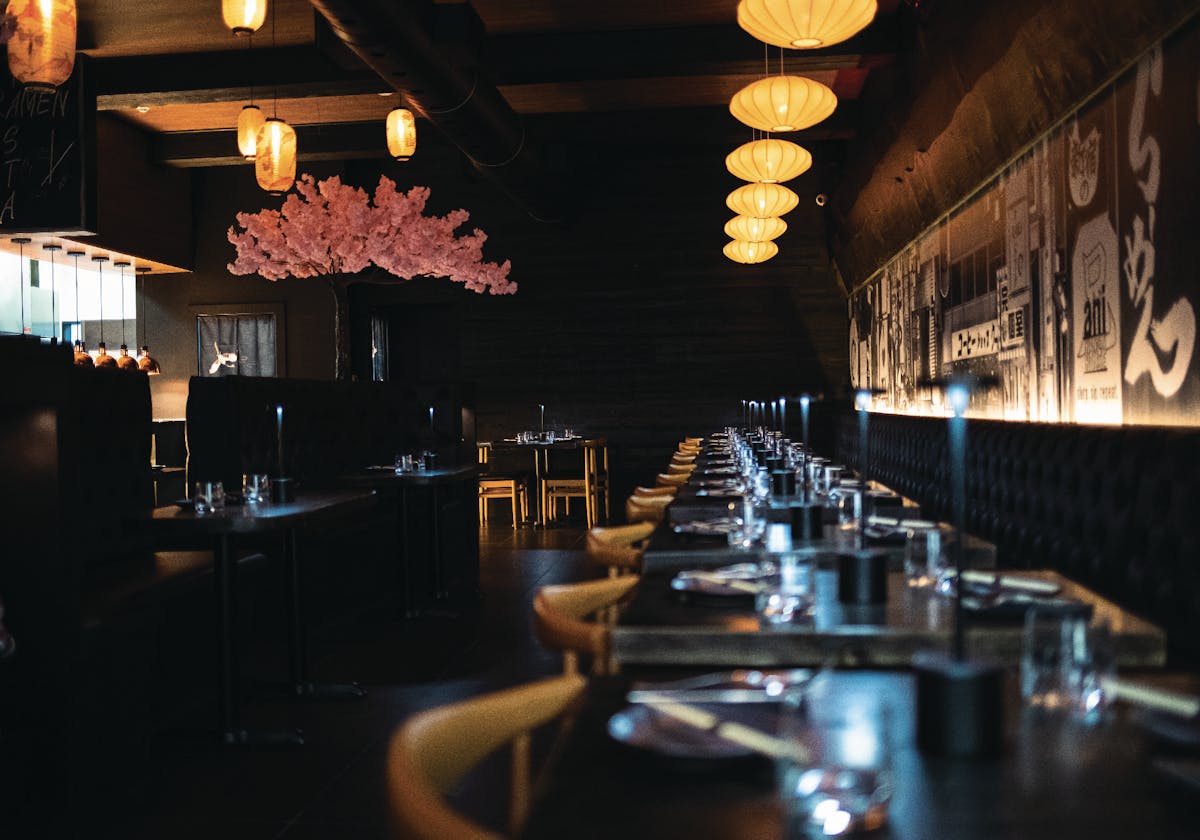 Wafu Italian dining room at pastaRAMEN with warm lighting and modern design