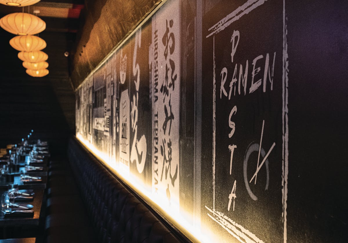 Japanese-inspired ramen signage lining the hallway at pastaRAMEN