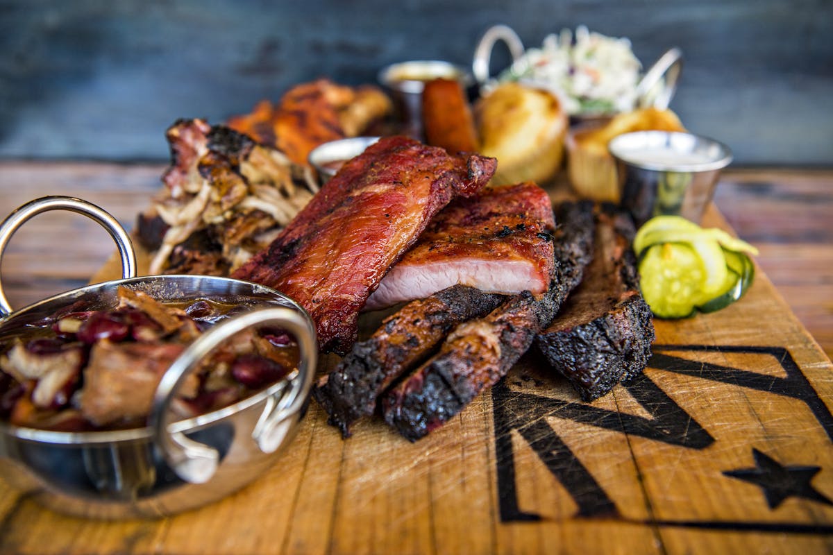 a plate of food on a wooden table