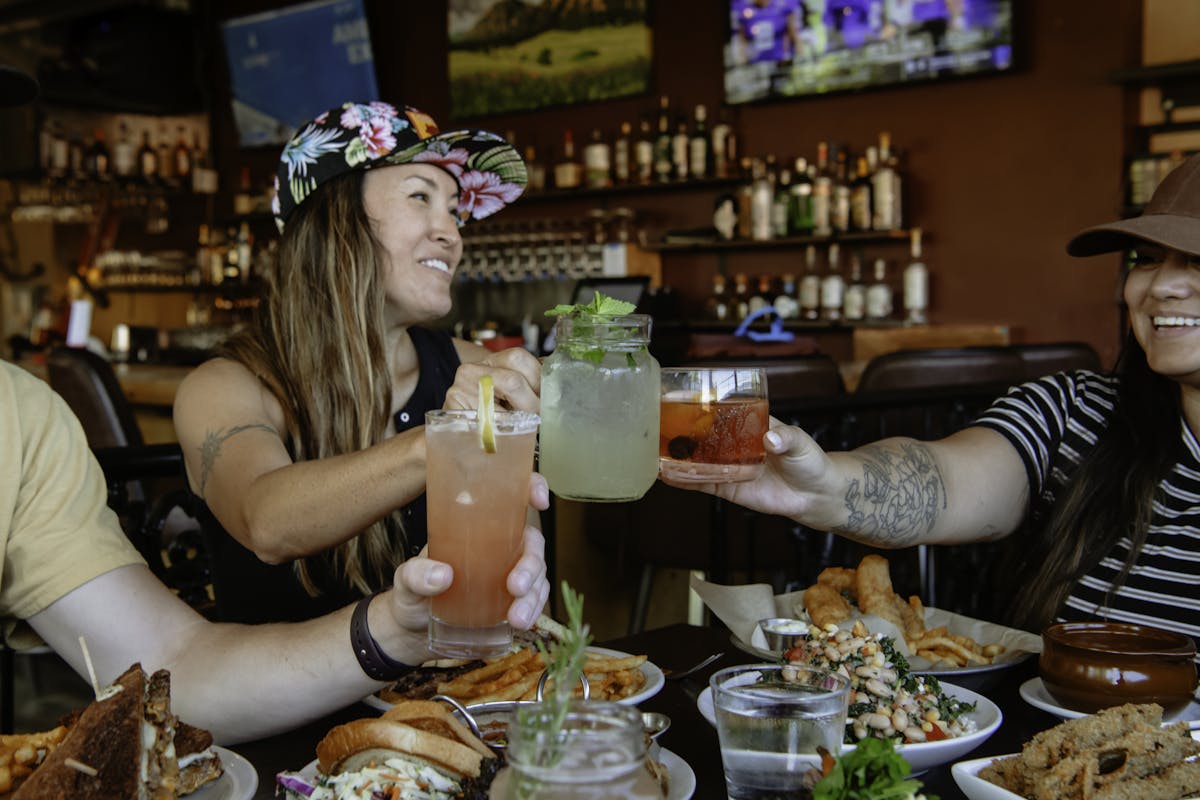 People with drinks and food