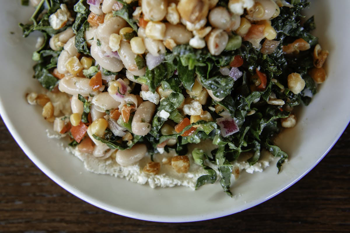 a close up photo of a salad