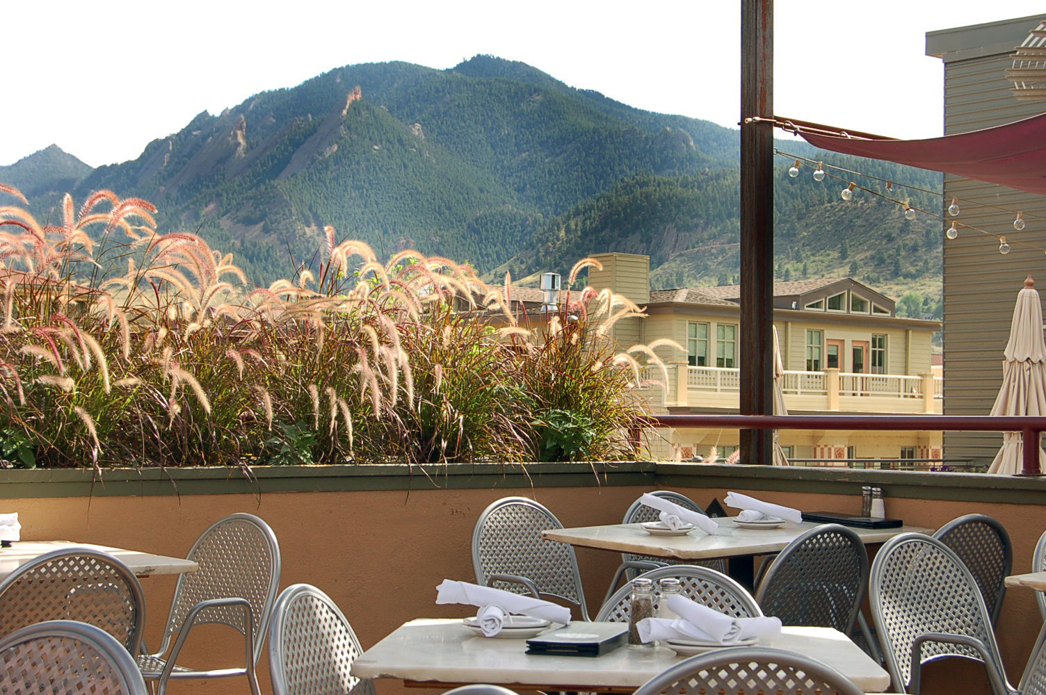 a chair sitting in front of a mountain