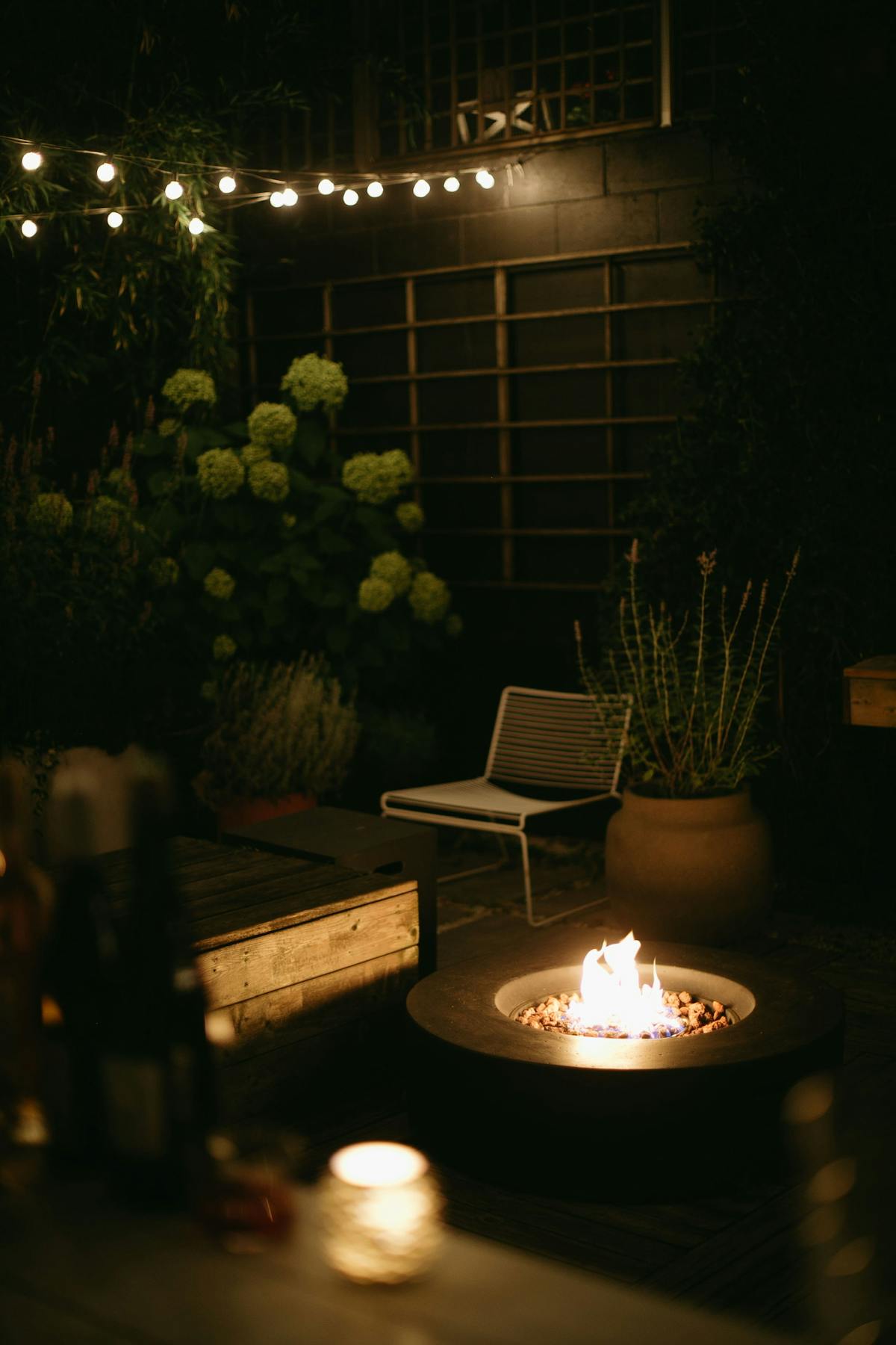 a lit candle on a table