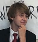 a person wearing a suit and tie