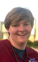 a person smiling for the camera