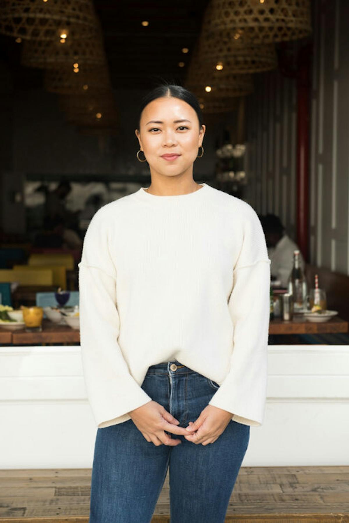 a person standing posing for the camera