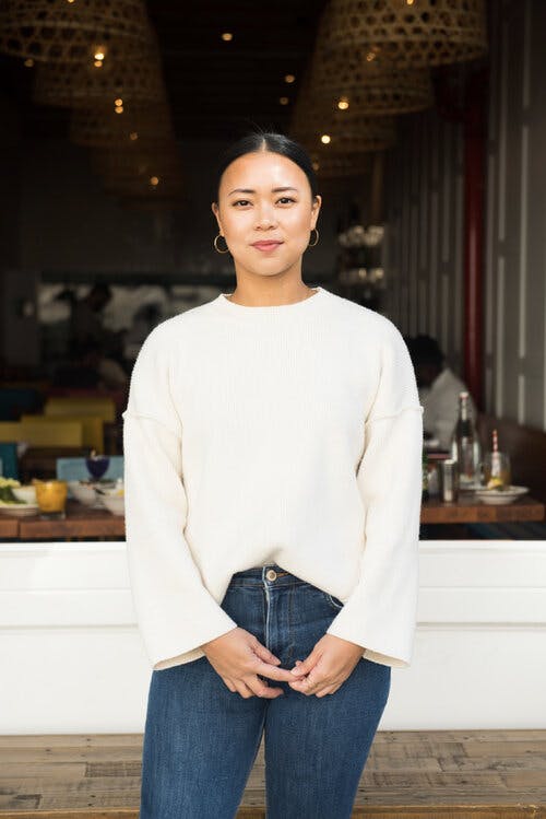 a person standing posing for the camera