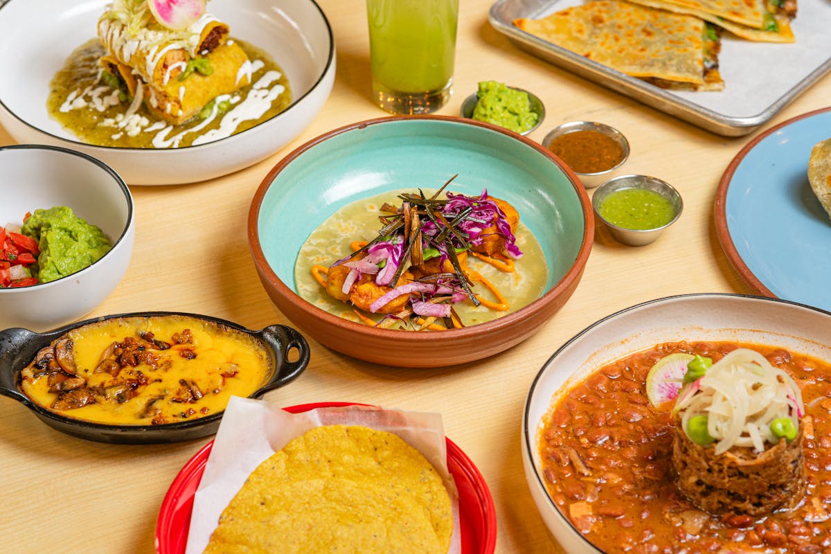 a table topped with different types of food on a plate