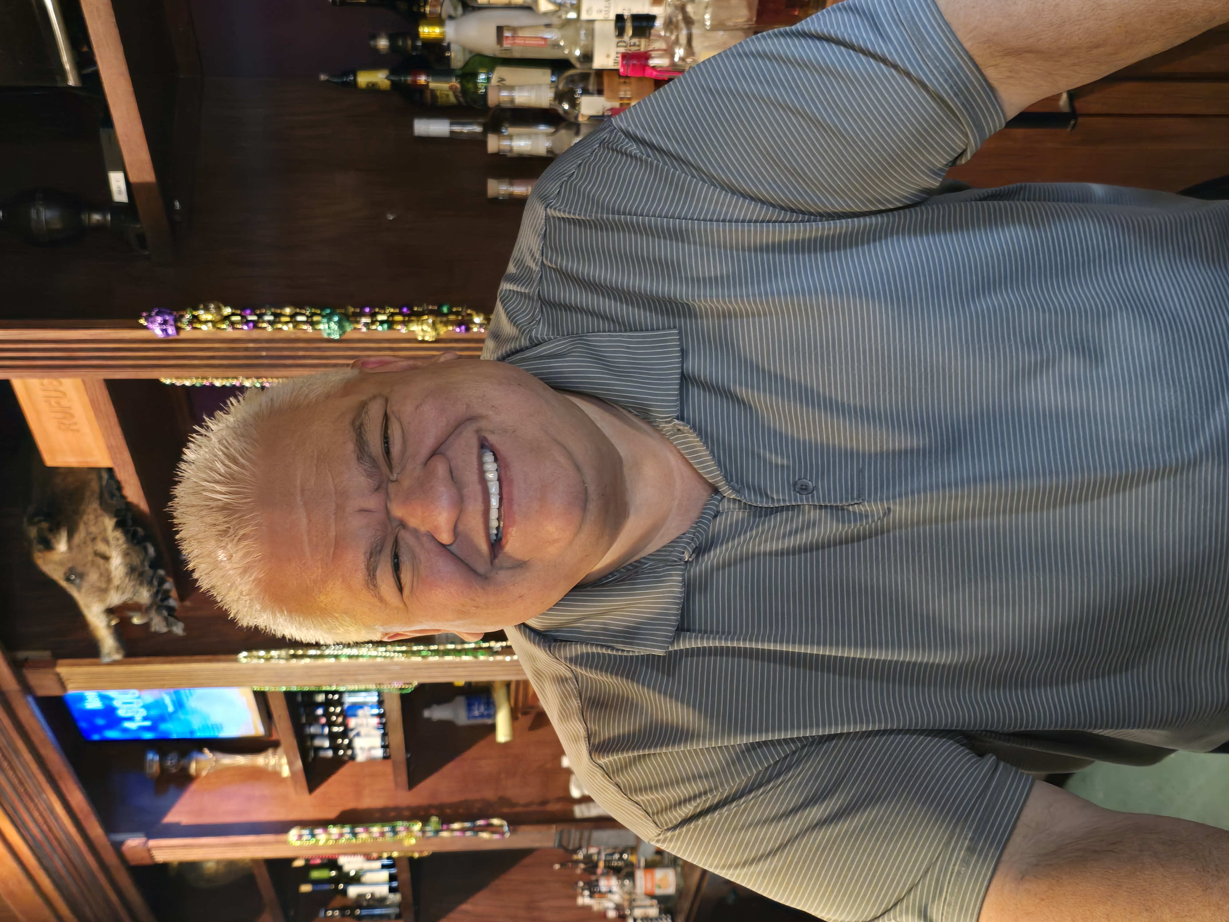 a man sitting at a table in a restaurant