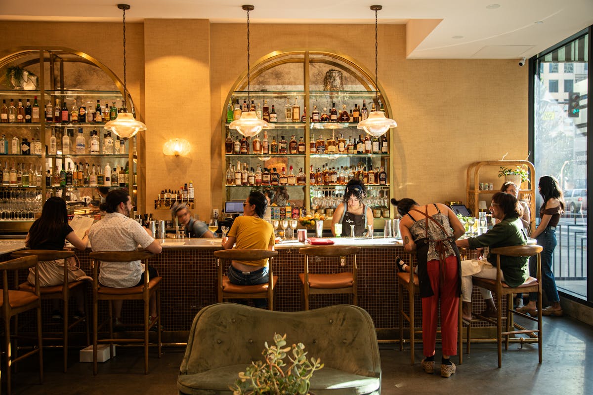 a person sitting at a table in a room