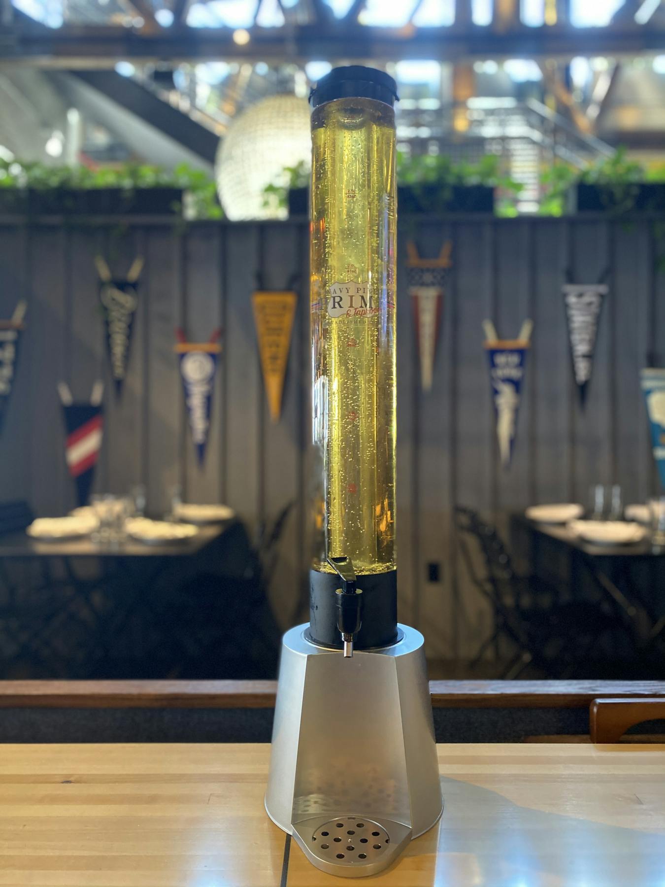 a vase sitting on top of a wooden table