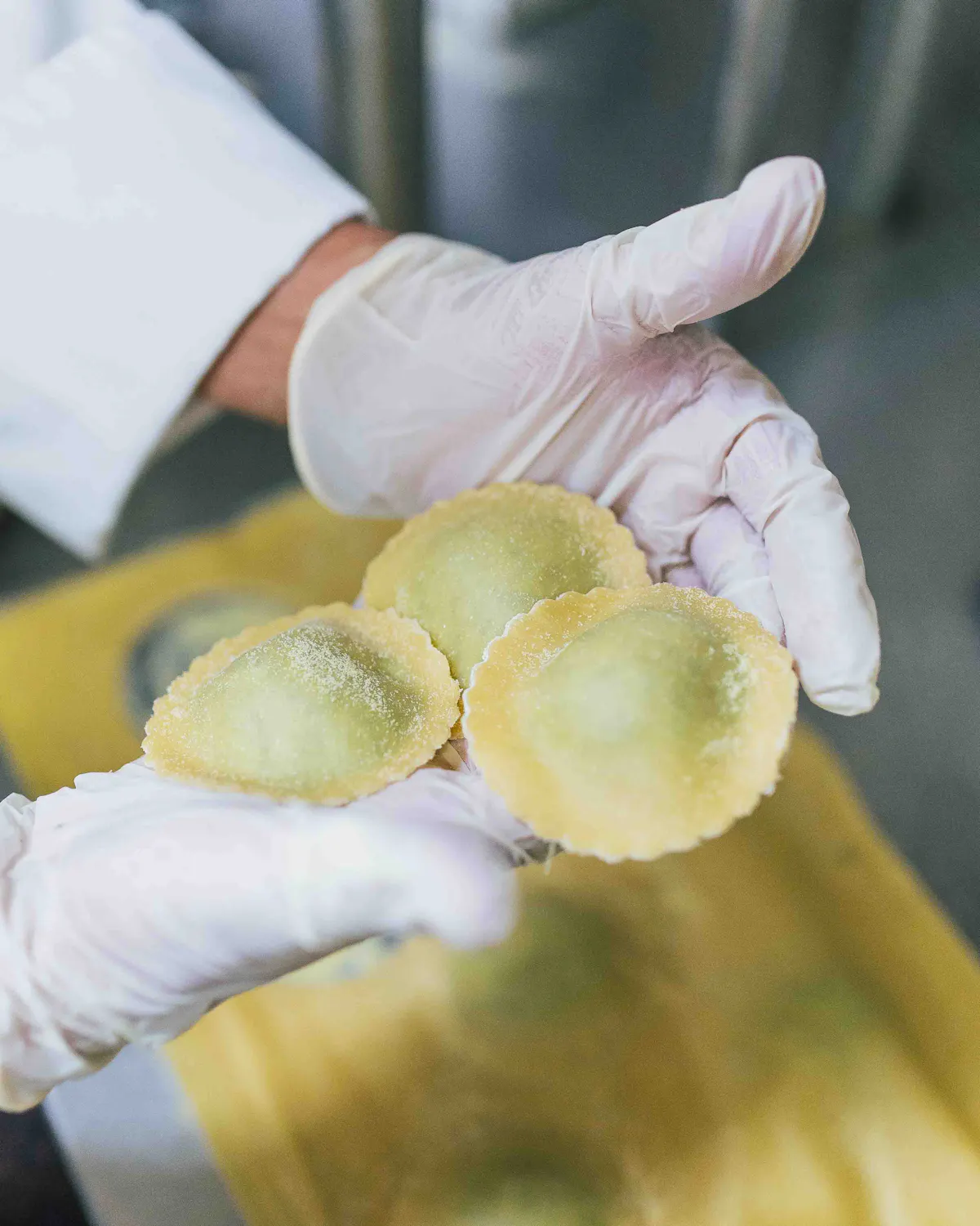 a person holding food in their hands