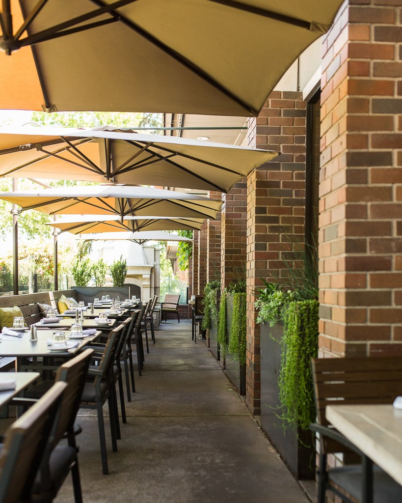 a restaurant with tables and chairs