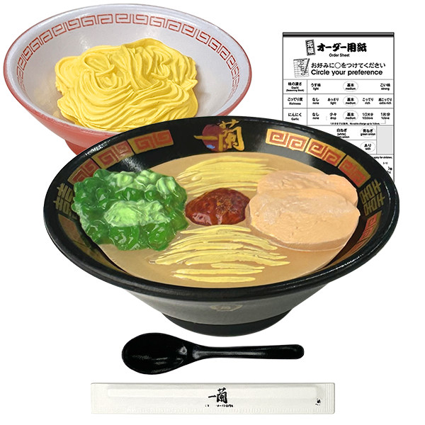 Miniature bowl of Classic Tonkotsu Ramen, bowl of Kae-Dama, order form, renge spoon, and chopstick in sleev