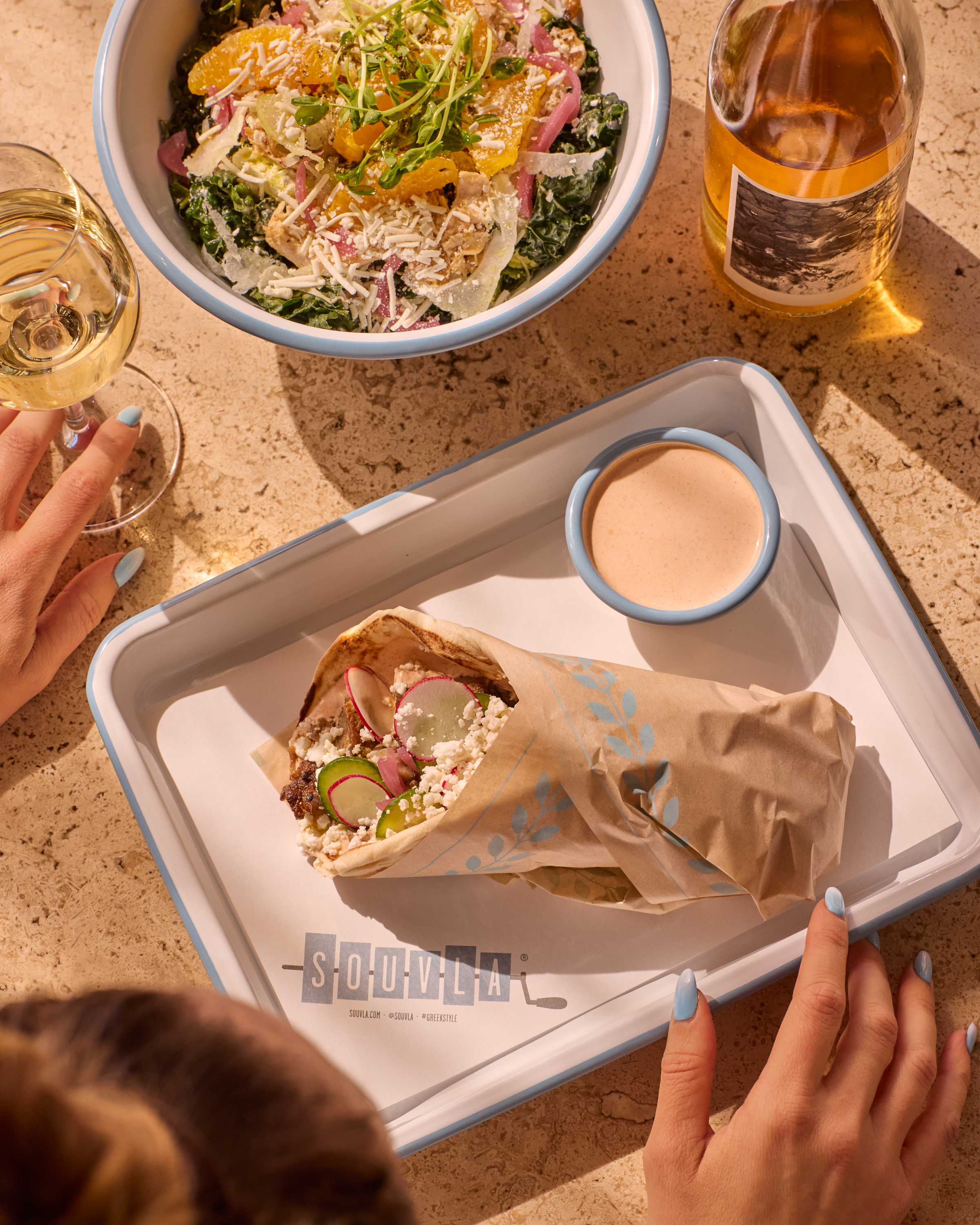 a plate of food and a bowl of salad