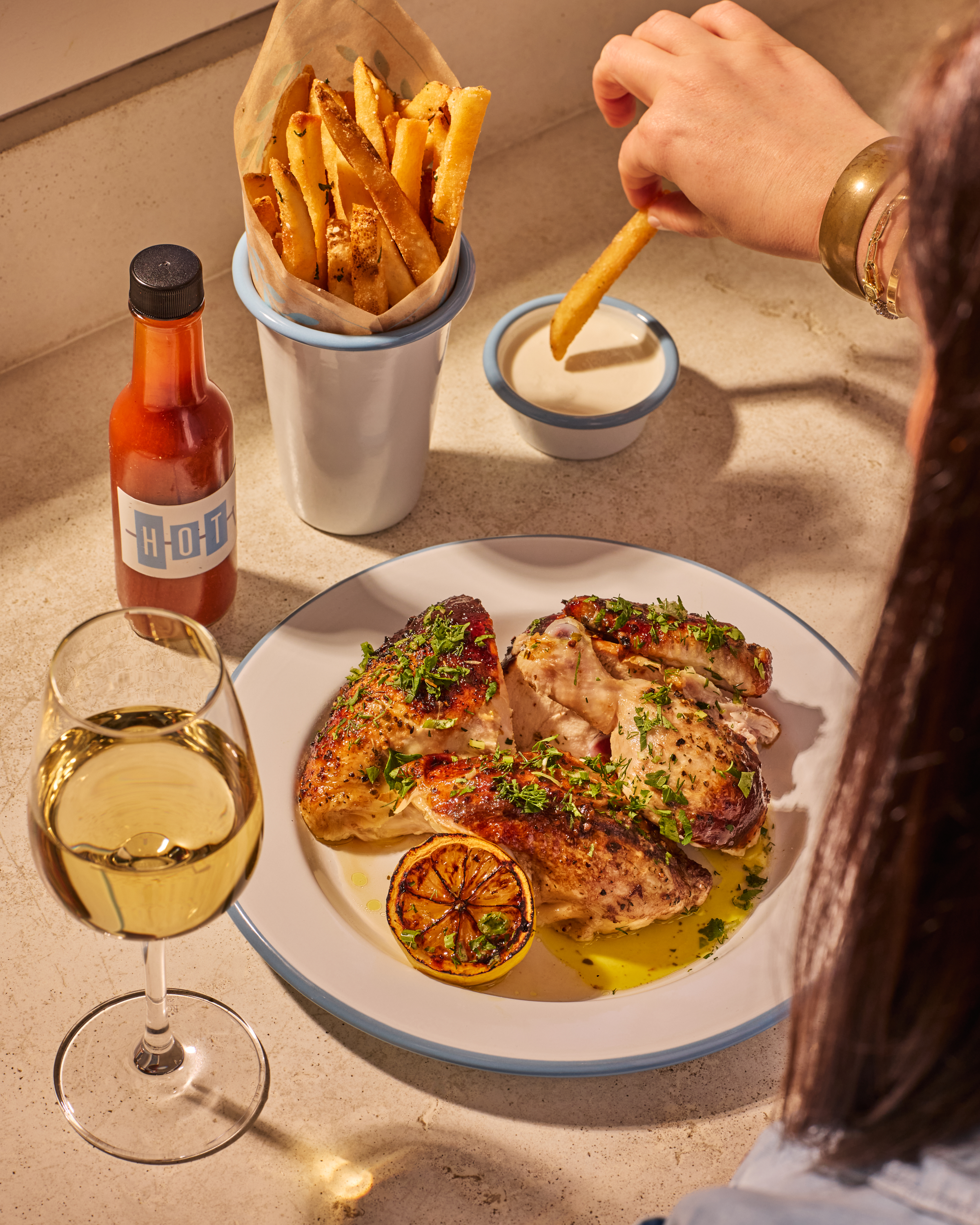 a plate of chicken and french fries