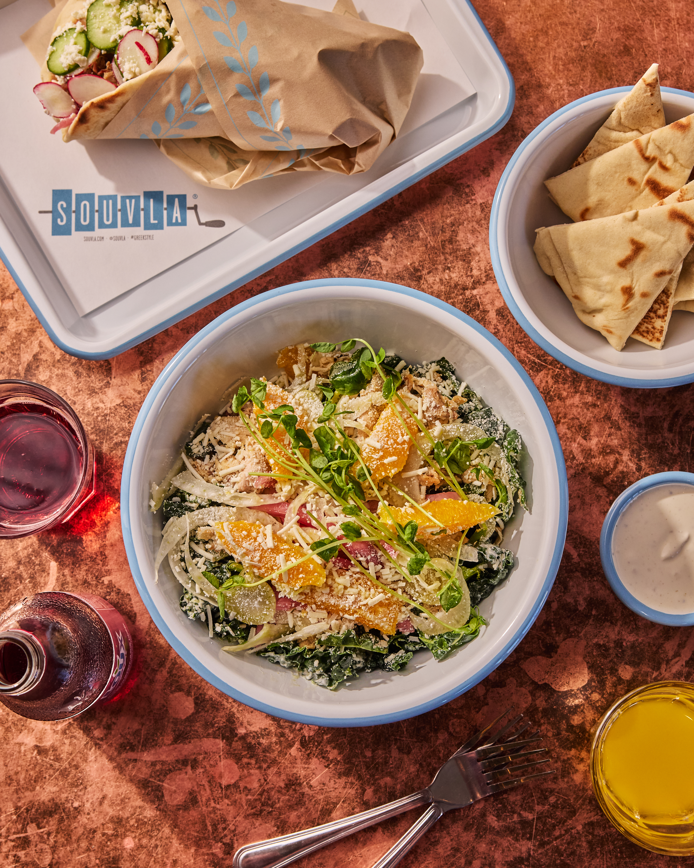 a bowl of salad with food in it