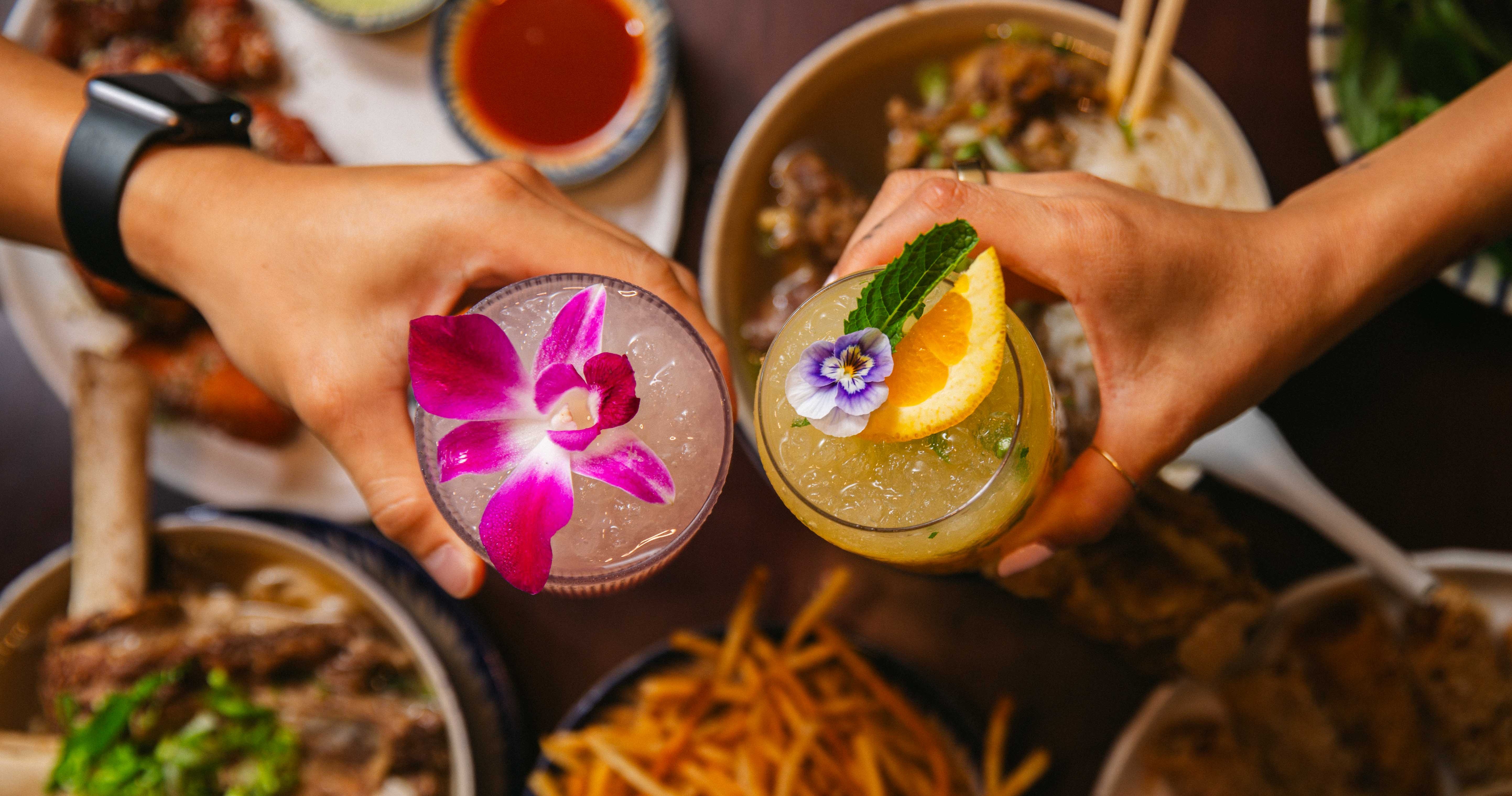 a person holding a bowl of food