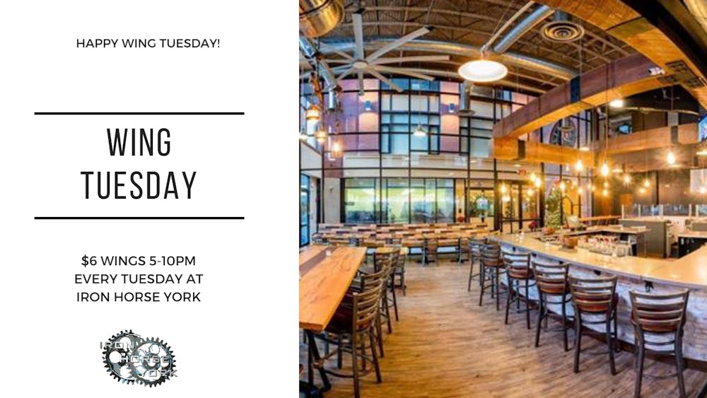 a chair sitting in front of a building