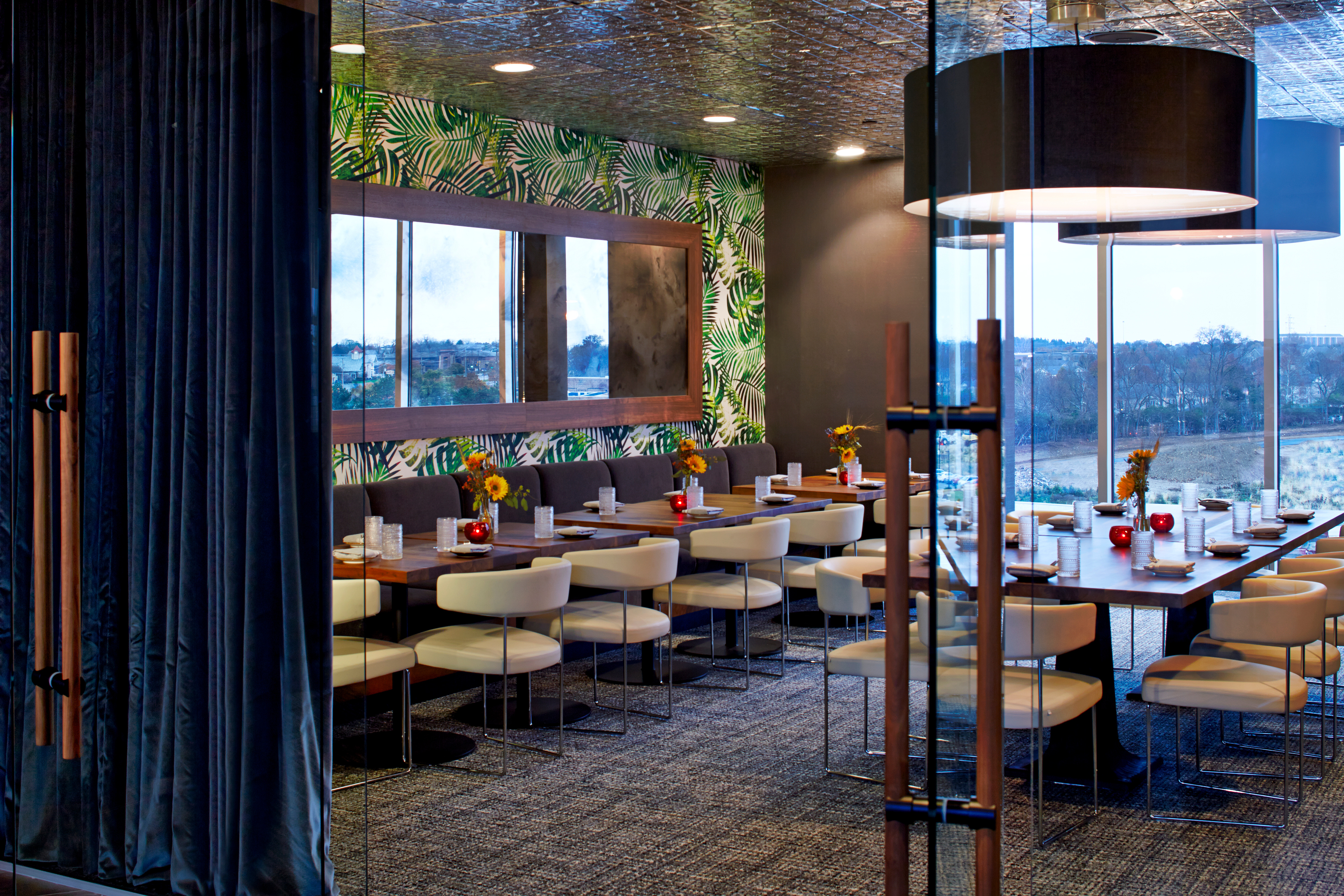 a room with a table and chairs