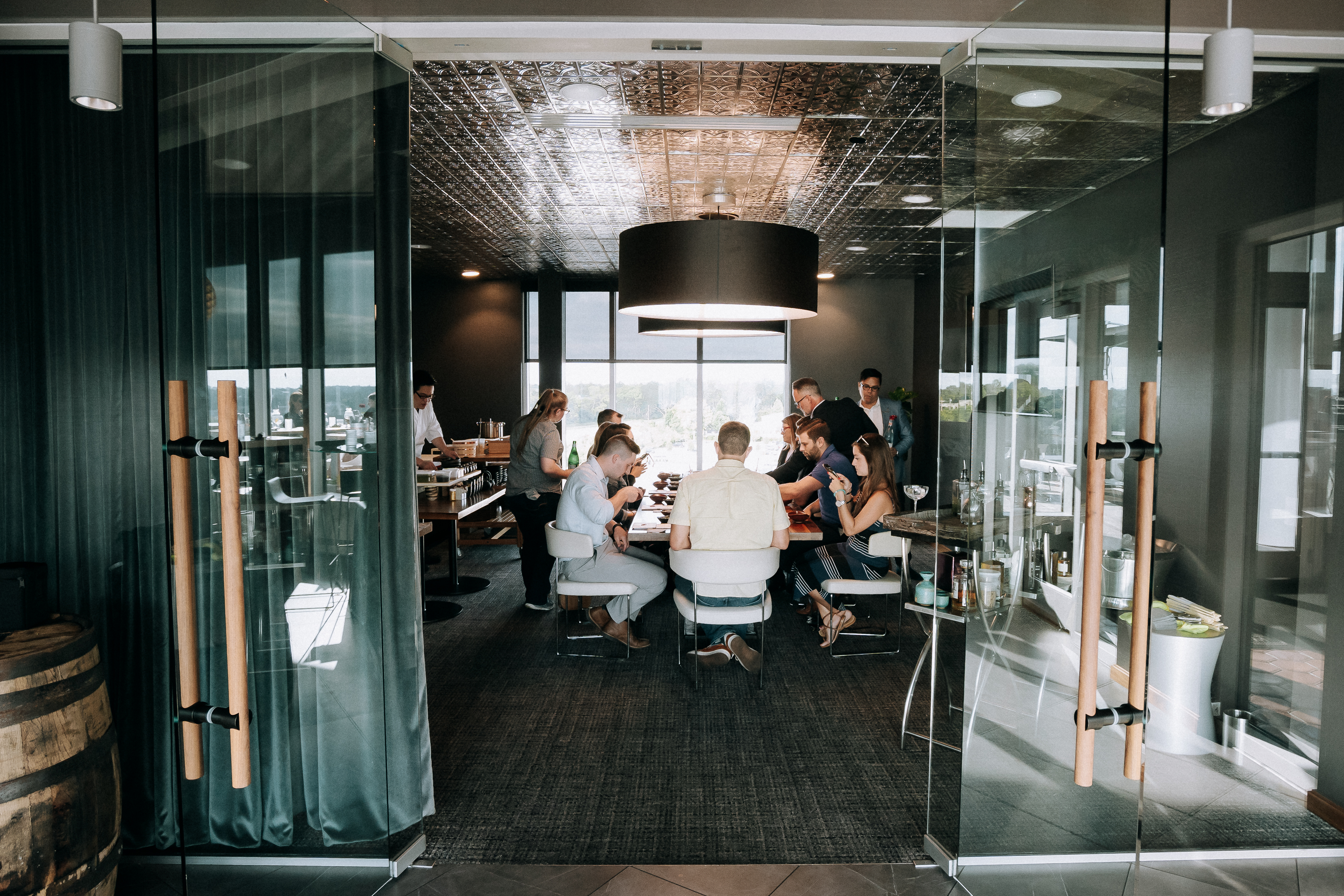 a group of people sitting around a table